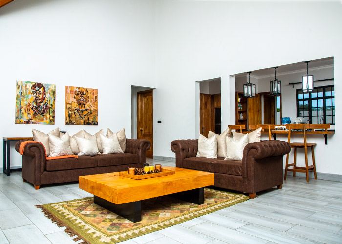 Living room with art and leather sofas